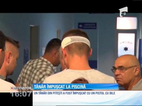 Tânăr împușcat la piscină