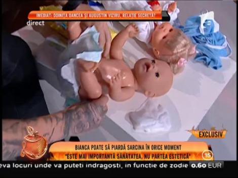 Bianca Drăgușanu învață să schimbe un bebeluș de scutec