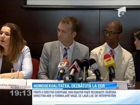 Un cuplu de bărbaţi cere recunoaşterea căsătoriei lor, oficiată în Belgia