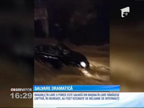 Și-au riscat vieţile pentru salvarea unei femei rămasă captivă în maşină