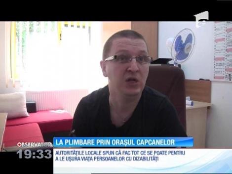 Pentru persoanele cu dizabilităţi, orice plimbare prin oraş e o adevărată provocare