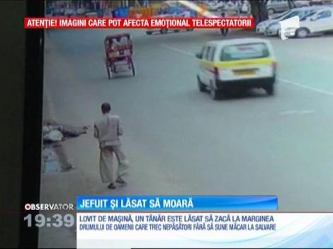 Imagini şocante în China! Un tânăr lovit de maşină, jefuit şi lăsat să moară