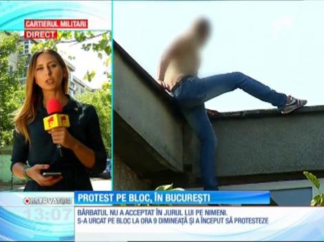 Un bărbat a protestat pe un bloc de 4 etaje din Bucureşti mai bine de 3 ore