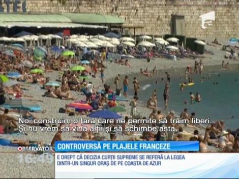Controversă pe plajele franceze. 22 de localități de pe Coasta de Azur au interzis veșmântul de tip burkini, specific musulman