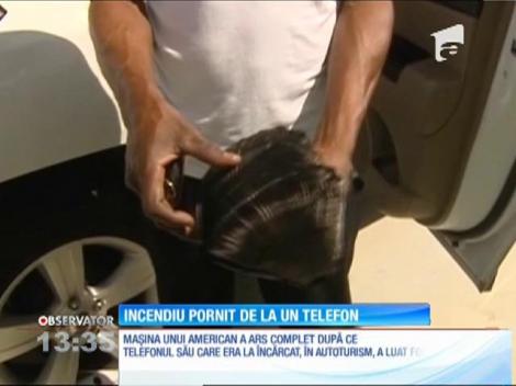 Mașina unui american a fost făcută scrum! A ars complet, după ce și-a lăsat telefonul la încărcat