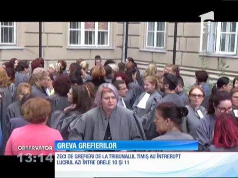 Zeci de grefieri de la Tribunalul Timiş au întrerupt lucrul