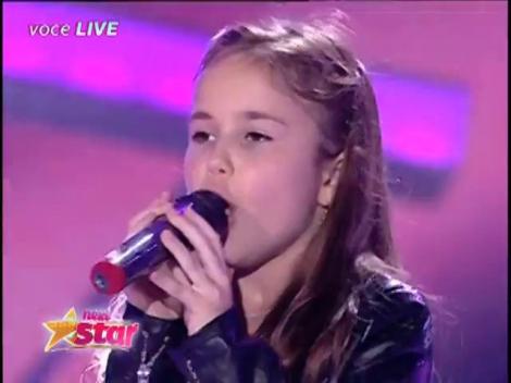 “Are nouă ani şi plângea microfonul ăla. Mi-ai făcut pielea de găină”. Micuţa Cristina Apostolache şi-a pus tot sufletul într-o piesă de oameni mari