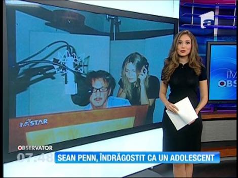 Sean Penn, ca un adolescent îndrăgostit lângă noua lui cucerire