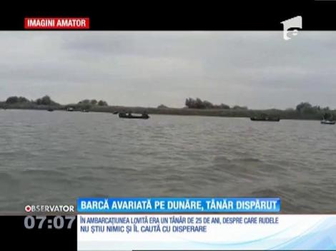 Barcă avariată pe Dunăre, tânăr dispărut
