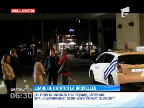 Cel puţin 15 oameni au fost luaţi ostatici într-un supermaket, timp de câteva ore