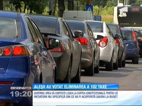 Deputaţii au votat eliminarea celor 102 taxe de la 1 Ianuarie 2017