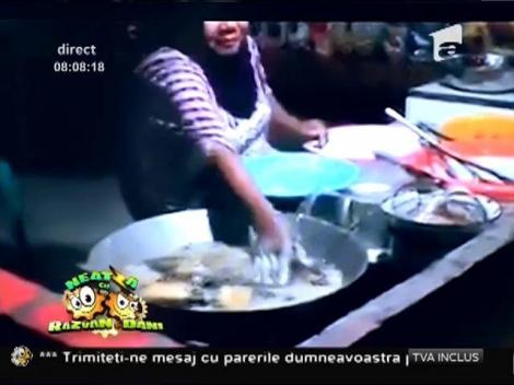 Smiley News: Un bucătar îşi bagă mâinile în ulei incins fără să sufere arsuri