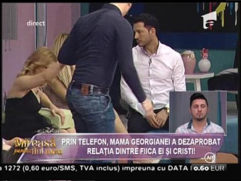 Prin telefon, mama Georgianei a dezaprobat relaţia dintre fiica ei şi Cristi