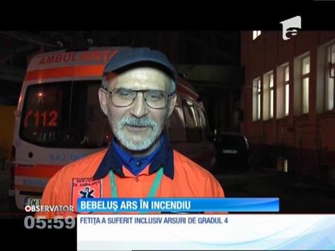 Bebeluș ars în incediu