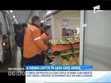 Un băiețel, captiv în casa care ardea