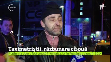 Şoferii Uber, bombardaţi cu ouă în faţa unui mall din Capitală.