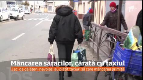 Zeci de gălăţeni nevoiaşi au plătit taxiuri să care mâncarea primită