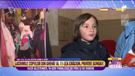 Un băieţel de șase ani şi surioara lui de doar patru  luni se pregătesc să sărbătorească Crăciunul în... ghenă.