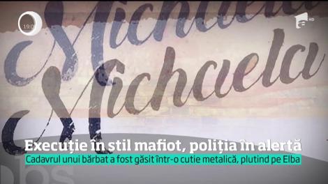 O execuţie în stil mafiot pune poliţia în alertă. Un bărbat a fost găsit mort într-o ladă metalică, plutind pe un râu din Germania