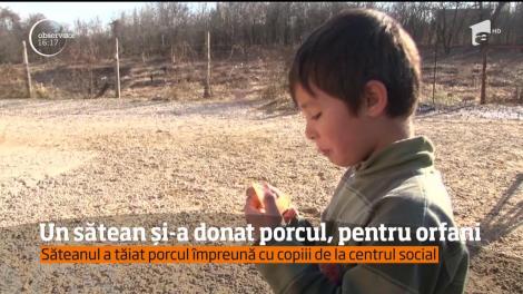 Un bărbat dintr-o localitate dâmboviţeană și-a donat porcul de Crăciun unor orfani