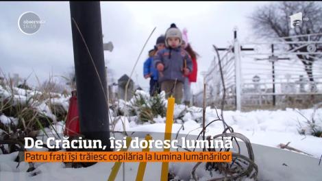 Patru copii îi cer Moşului un singur lucru: să le aducă lumină!