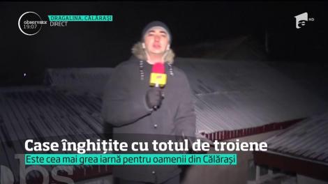 Case înghițite cu totul de troiene!