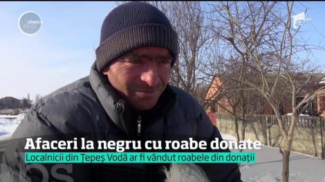 Afaceri cu ajutoarele primite de la un ONG! 200 de kit-uri de deszăpezire donate de o asociaţie, vândute la negru