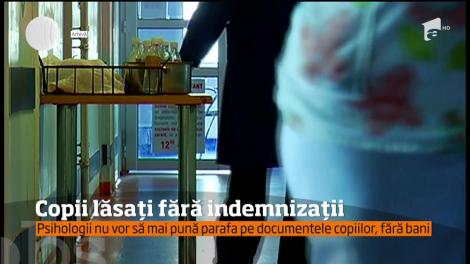 Psihologii nu vor să mai pună parafa pe documentele copiilor, fără bani