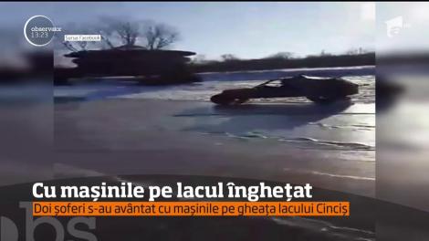 Doi șoferi s-au avântat cu mașinile pe gheața lacului Cinciș