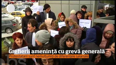 Grefierii amenință cu greva generală