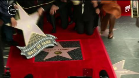 Solistul trupei Maroon 5, Adam Levine, a primit o stea pe bulevardul Walk of Fame de la Hollywood. Fetiţa artistului, în vârstă de doar câteva luni, a fost prezentă. Te topeşti de dragul ei!