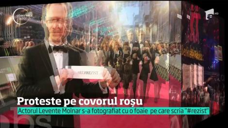 Protestele din piaţa Victoriei au ajuns şi pe covorul roşu de la Berlin