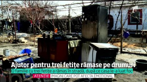 O familie cu trei fetiţe a rămas pe străzi, după ce casa le-a luat foc!