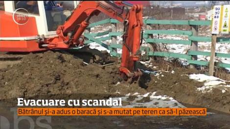 Un om din Târgu-Jiu se opune ca muncitorii să lucreze la șoseaua de centură