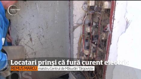 Locatari prinși că fura curent electric