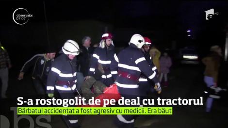 S-a rostogolit de pe deal cu tractorul şi a scăpat ca prin minune cu viaţă!