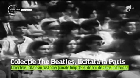 O colecţie impresionantă cu obiecte dedicate trupei Beatles a fost scoasă la licitaţie, la Paris