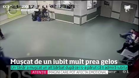 VIDEO / Credeați că doar câinii mușcă oameni? Un bărbat a fost "capsat" de un concetățean gelos. Tânărul s-a repezit la gâtul și urechile victimei