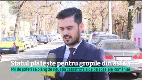 Statul plăteşte pentru gropile din asfalt