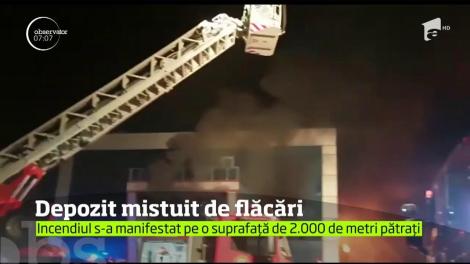 Depozit din Afumați, mistuit de flăcări