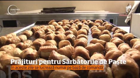 E agitaţie mare în cofetării. În toate laboratoarele se frământă, se însiropează şi se fac decoraţiuni pentru torturi