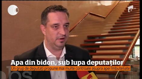 Un grup de deputați propune mai multe controale asupra apei îmbuteliate