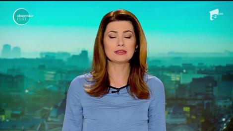 Mama medicului român ai cărei copii au fost luaţi de statul finlandez protestează de una singură în Piatra Neamţ