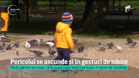 Pericolul se ascunde și în gesturi de iubire. Din dragoste pentru pruncii lor, sunt mii de părinţi care îi sărută direct pe buze