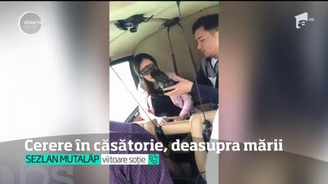 Cea mai frumoasă declarație de dragoste! Un tânăr şi-a cerut iubita în căsătorie, în elicopter, deasupra Mării Negre