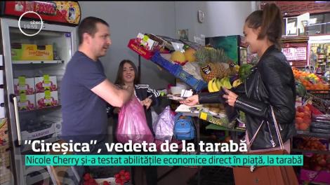 Din dragoste pentru cireşe, şi-a schimbat numele şi a devenit Nicole Cherry. De pe scenă, cântăreaţa a coborât în piaţă, să vândă fructele ei preferate