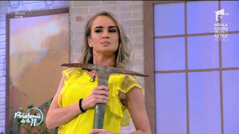 Diana Munteanu, ședință foto cu un târnăcop: "Fii sexy"