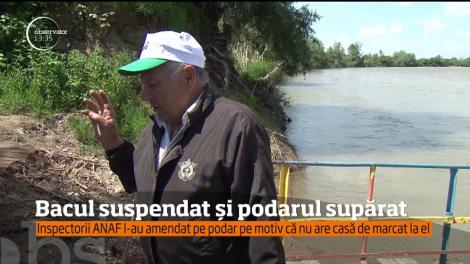 Ultimul bac funcţional din judeţul Satu Mare a rămas la mal. Inspectorii ANAF l-au amendat pe podar cu 6.000 de lei