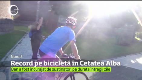 Record pe două roţi, la Cetatea Alba! Deţinătorul "celui mai bun job din lume" celebrează cei 100 de ani de la Marea Unire pe bicicletă