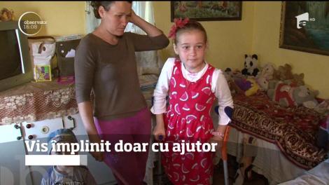 Andreea, o copilă de nouă ani din Iași, s-a născut cu o problemă gravă la picioare şi abia poate merge cu ajutorul unor cârje
